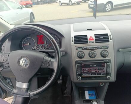 Серый Фольксваген Туран, объемом двигателя 10 л и пробегом 170 тыс. км за 7903 $, фото 5 на Automoto.ua