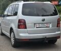 Серый Фольксваген Туран, объемом двигателя 2 л и пробегом 237 тыс. км за 9699 $, фото 2 на Automoto.ua