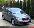 Серый Фольксваген Туран, объемом двигателя 1.4 л и пробегом 223 тыс. км за 7300 $, фото 1 на Automoto.ua
