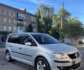 Сірий Фольксваген Туран, об'ємом двигуна 2 л та пробігом 320 тис. км за 5497 $, фото 1 на Automoto.ua