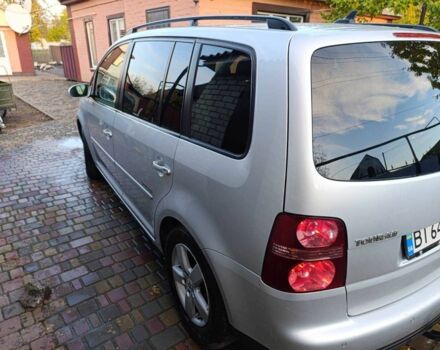 Сірий Фольксваген Туран, об'ємом двигуна 1.4 л та пробігом 215 тис. км за 7500 $, фото 3 на Automoto.ua