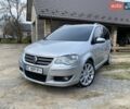 Сірий Фольксваген Туран, об'ємом двигуна 1.97 л та пробігом 345 тис. км за 8499 $, фото 1 на Automoto.ua