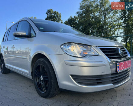 Серый Фольксваген Туран, объемом двигателя 1.4 л и пробегом 235 тыс. км за 7450 $, фото 2 на Automoto.ua