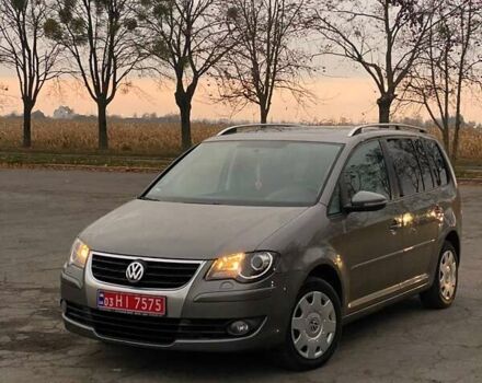 Сірий Фольксваген Туран, об'ємом двигуна 1.4 л та пробігом 174 тис. км за 6999 $, фото 1 на Automoto.ua