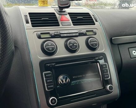 Серый Фольксваген Туран, объемом двигателя 1.4 л и пробегом 256 тыс. км за 7490 $, фото 22 на Automoto.ua
