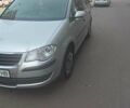 Сірий Фольксваген Туран, об'ємом двигуна 1.4 л та пробігом 225 тис. км за 7800 $, фото 1 на Automoto.ua