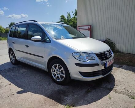 Серый Фольксваген Туран, объемом двигателя 1 л и пробегом 260 тыс. км за 7500 $, фото 1 на Automoto.ua