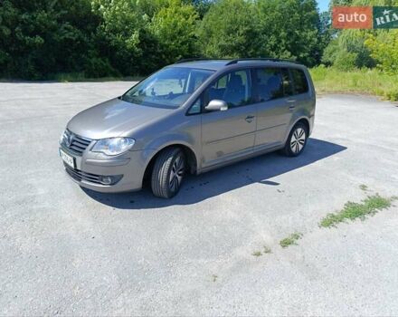 Серый Фольксваген Туран, объемом двигателя 1.9 л и пробегом 237 тыс. км за 7600 $, фото 5 на Automoto.ua