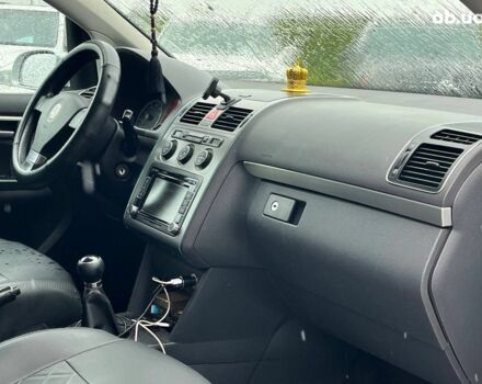 Серый Фольксваген Туран, объемом двигателя 1.4 л и пробегом 256 тыс. км за 7490 $, фото 4 на Automoto.ua