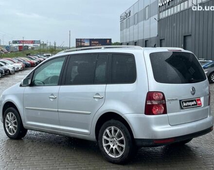 Серый Фольксваген Туран, объемом двигателя 1.4 л и пробегом 256 тыс. км за 7490 $, фото 3 на Automoto.ua