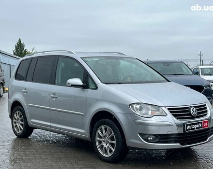 Серый Фольксваген Туран, объемом двигателя 1.4 л и пробегом 256 тыс. км за 7490 $, фото 1 на Automoto.ua