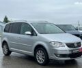 Серый Фольксваген Туран, объемом двигателя 1.4 л и пробегом 256 тыс. км за 7490 $, фото 1 на Automoto.ua