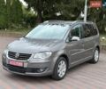 Серый Фольксваген Туран, объемом двигателя 1.4 л и пробегом 191 тыс. км за 7500 $, фото 1 на Automoto.ua