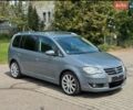 Серый Фольксваген Туран, объемом двигателя 2 л и пробегом 257 тыс. км за 9500 $, фото 1 на Automoto.ua