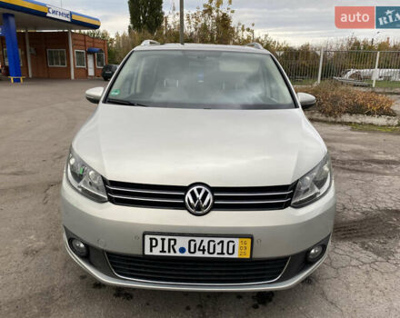 Серый Фольксваген Туран, объемом двигателя 1.39 л и пробегом 168 тыс. км за 9500 $, фото 2 на Automoto.ua
