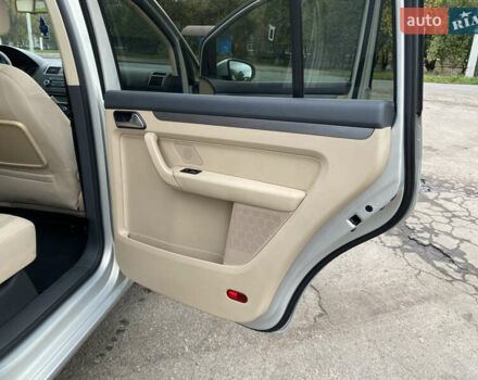 Серый Фольксваген Туран, объемом двигателя 1.39 л и пробегом 168 тыс. км за 9500 $, фото 45 на Automoto.ua