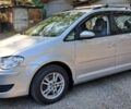 Сірий Фольксваген Туран, об'ємом двигуна 1.4 л та пробігом 150 тис. км за 7301 $, фото 1 на Automoto.ua