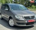 Серый Фольксваген Туран, объемом двигателя 1.4 л и пробегом 239 тыс. км за 7400 $, фото 1 на Automoto.ua