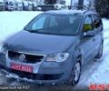 Серый Фольксваген Туран, объемом двигателя 1.4 л и пробегом 179 тыс. км за 7400 $, фото 1 на Automoto.ua