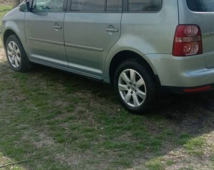 Серый Фольксваген Туран, объемом двигателя 1.4 л и пробегом 3 тыс. км за 6162 $, фото 1 на Automoto.ua