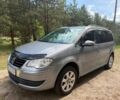Серый Фольксваген Туран, объемом двигателя 1.4 л и пробегом 195 тыс. км за 6450 $, фото 1 на Automoto.ua