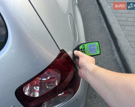 Серый Фольксваген Туран, объемом двигателя 1.4 л и пробегом 179 тыс. км за 8500 $, фото 50 на Automoto.ua