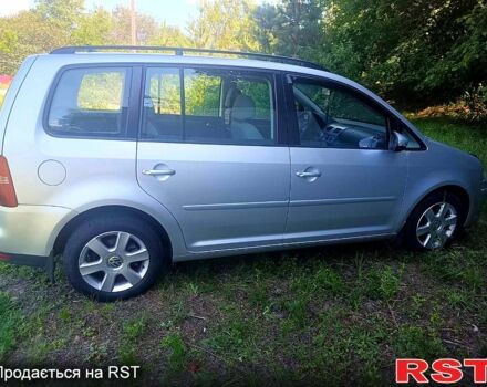 Серый Фольксваген Туран, объемом двигателя 1.4 л и пробегом 228 тыс. км за 7300 $, фото 2 на Automoto.ua