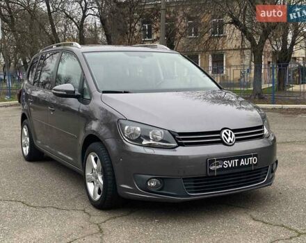 Серый Фольксваген Туран, объемом двигателя 1.39 л и пробегом 174 тыс. км за 10200 $, фото 2 на Automoto.ua