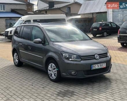 Серый Фольксваген Туран, объемом двигателя 1.4 л и пробегом 220 тыс. км за 10500 $, фото 2 на Automoto.ua