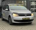 Серый Фольксваген Туран, объемом двигателя 1.4 л и пробегом 224 тыс. км за 7500 $, фото 1 на Automoto.ua