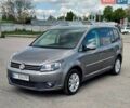 Серый Фольксваген Туран, объемом двигателя 1.4 л и пробегом 223 тыс. км за 9500 $, фото 1 на Automoto.ua