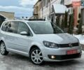 Сірий Фольксваген Туран, об'ємом двигуна 2 л та пробігом 249 тис. км за 12950 $, фото 1 на Automoto.ua