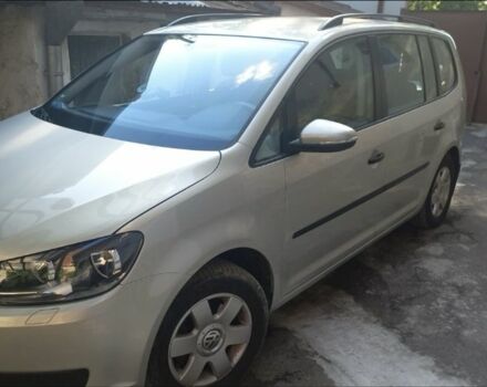 Серый Фольксваген Туран, объемом двигателя 1.4 л и пробегом 200 тыс. км за 12880 $, фото 1 на Automoto.ua