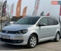 Сірий Фольксваген Туран, об'ємом двигуна 1.6 л та пробігом 250 тис. км за 10999 $, фото 1 на Automoto.ua