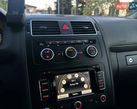 Фольксваген Туран 2013 в Сарнах на Automoto.ua Серый Фольксваген Туран, объемом двигателя 1.6 л и пробегом 249 тыс. км за 11350 $, фото 47 на Automoto.ua