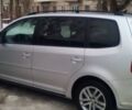 Сірий Фольксваген Туран, об'ємом двигуна 1.4 л та пробігом 150 тис. км за 11500 $, фото 1 на Automoto.ua