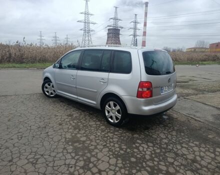 Серый Фольксваген Туран, объемом двигателя 2 л и пробегом 180 тыс. км за 2600 $, фото 3 на Automoto.ua