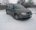 Серый Фольксваген Туран, объемом двигателя 1.9 л и пробегом 280 тыс. км за 2800 $, фото 1 на Automoto.ua