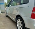 Фольксваген Туран 2004 у Києві на Automoto.ua Сірий Фольксваген Туран, об'ємом двигуна 1.98 л та пробігом 196 тис. км за 5990 $, фото 11 на Automoto.ua