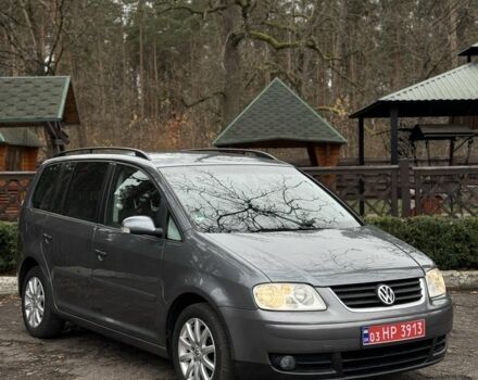 Сірий Фольксваген Туран, об'ємом двигуна 1.6 л та пробігом 200 тис. км за 5700 $, фото 1 на Automoto.ua