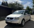 Серый Фольксваген Туран, объемом двигателя 1.9 л и пробегом 330 тыс. км за 3106 $, фото 1 на Automoto.ua