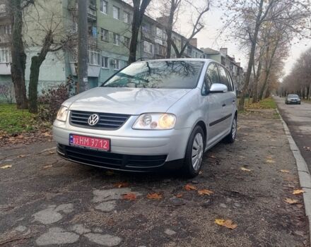 Серый Фольксваген Туран, объемом двигателя 1.6 л и пробегом 230 тыс. км за 5995 $, фото 1 на Automoto.ua