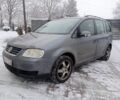 Сірий Фольксваген Туран, об'ємом двигуна 2 л та пробігом 312 тис. км за 3096 $, фото 1 на Automoto.ua