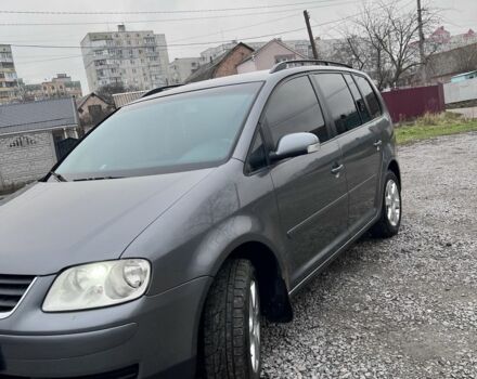 Серый Фольксваген Туран, объемом двигателя 2 л и пробегом 255 тыс. км за 5000 $, фото 1 на Automoto.ua