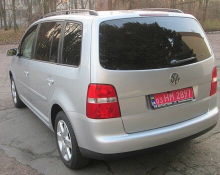 Серый Фольксваген Туран, объемом двигателя 1.6 л и пробегом 230 тыс. км за 6500 $, фото 1 на Automoto.ua