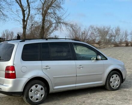 Сірий Фольксваген Туран, об'ємом двигуна 2 л та пробігом 380 тис. км за 3199 $, фото 2 на Automoto.ua