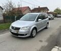 Серый Фольксваген Туран, объемом двигателя 1.4 л и пробегом 250 тыс. км за 4200 $, фото 1 на Automoto.ua