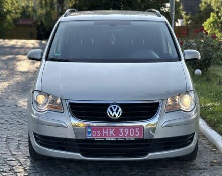 Серый Фольксваген Туран, объемом двигателя 1.4 л и пробегом 244 тыс. км за 6300 $, фото 1 на Automoto.ua
