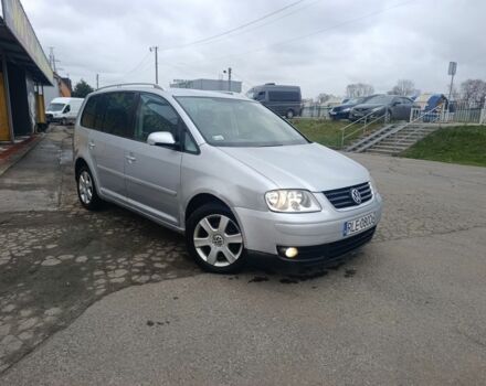 Серый Фольксваген Туран, объемом двигателя 2 л и пробегом 180 тыс. км за 2600 $, фото 1 на Automoto.ua