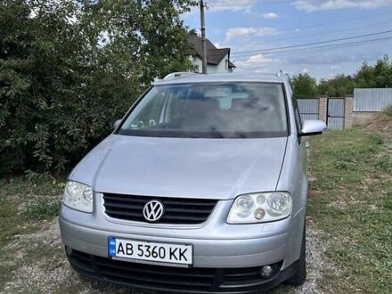 Серый Фольксваген Туран, объемом двигателя 1.6 л и пробегом 185 тыс. км за 5999 $, фото 1 на Automoto.ua